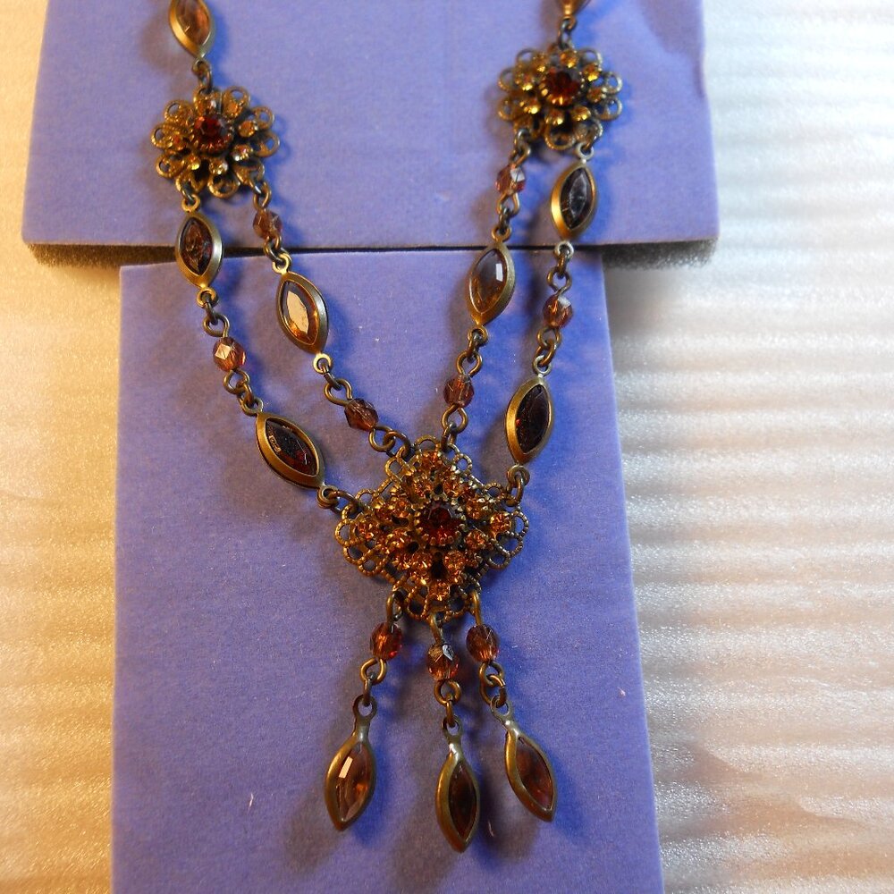 Avon - Topaz Rhinestone Swag Necklace  330.